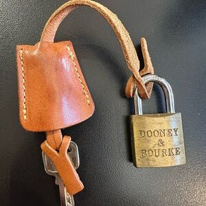 Dooney & Bourke Brown Leather Key Fob with Brass Padlock Charm